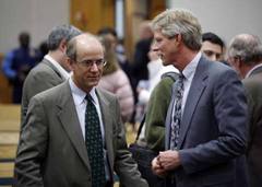 State Sen. Hollis French, D-Anchorage, left, talks with attorney Peter Maassen after oral arguments before the Alaska Supreme Court in Anchorage Oct. 8, 2008.