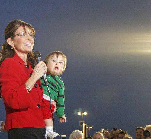 Sarah Palin once again using darling Trig Palin, a child with special needs, as a book tour prop in large crowds during the height of the H1N1 flu season.