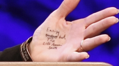 Closeup photo of Sarah Palin's left hand, complete with notes.